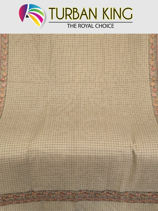 Beige color shawl with a grid pattern and decorative border